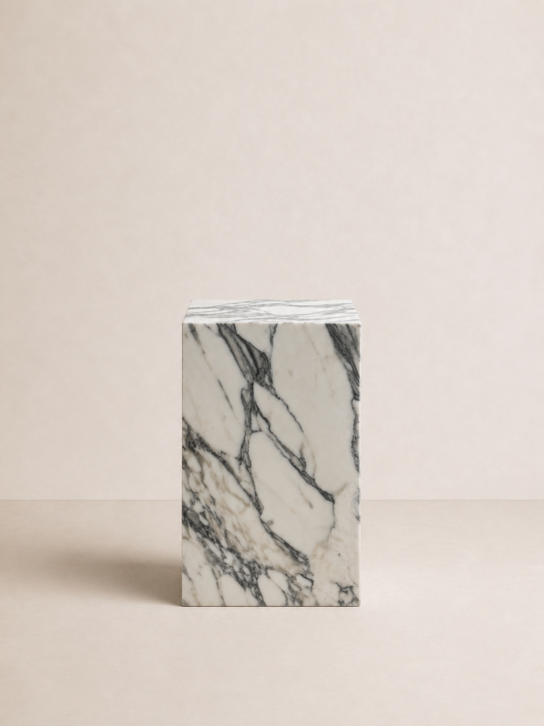 Luxury white marble with grey veining pattern rectangular block on a off white studio background