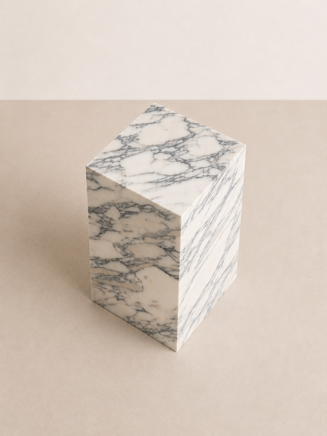Luxury white marble with grey veining pattern rectangular block on a off white studio background. Top view