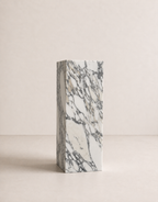 Luxury white marble with grey veining pattern rectangular block on a off white studio background