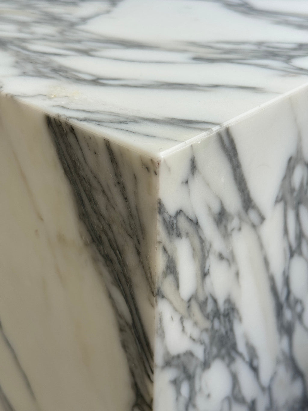 Close-up of a marble surface with gray and white patterns, honed finishing. Premium quality luxury marble.