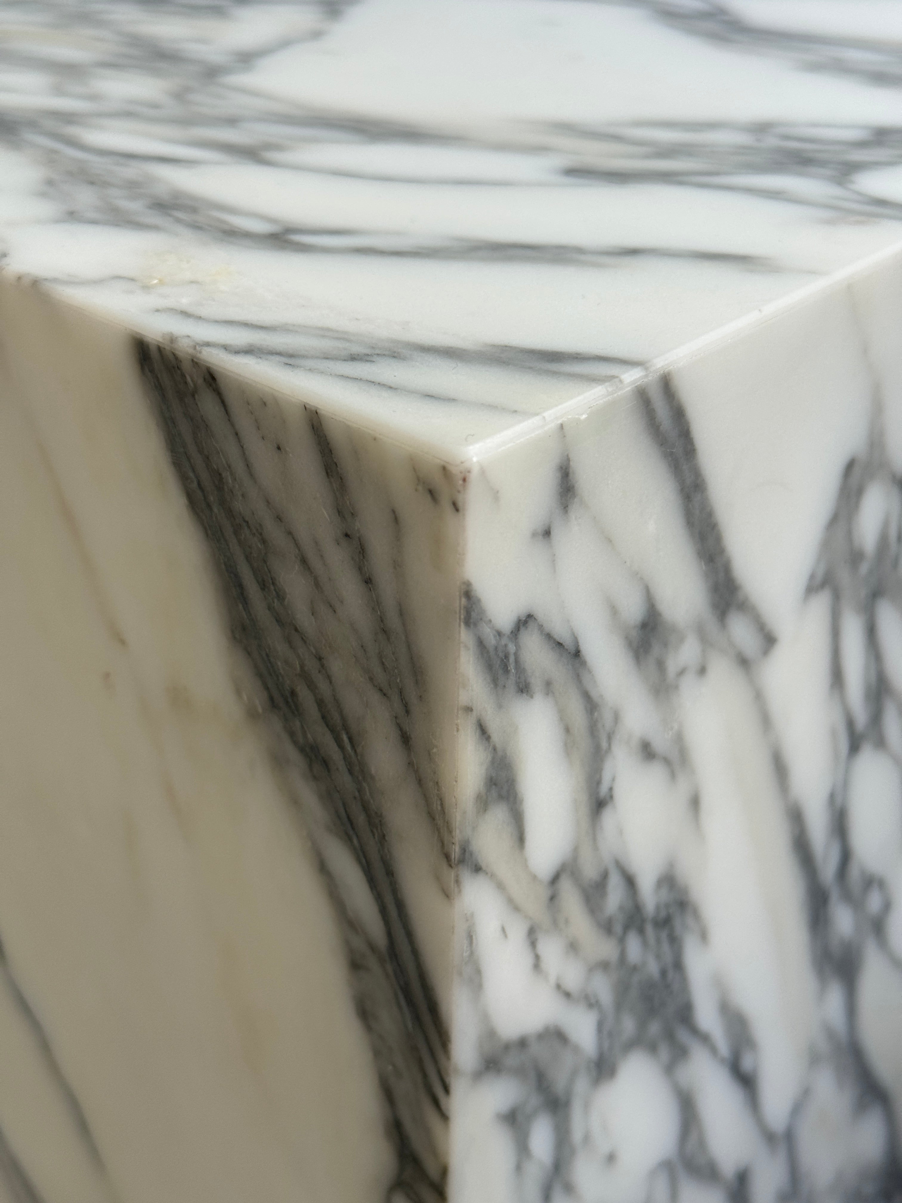 Close-up of a marble surface with gray and white patterns, honed finishing. Premium quality luxury marble.
