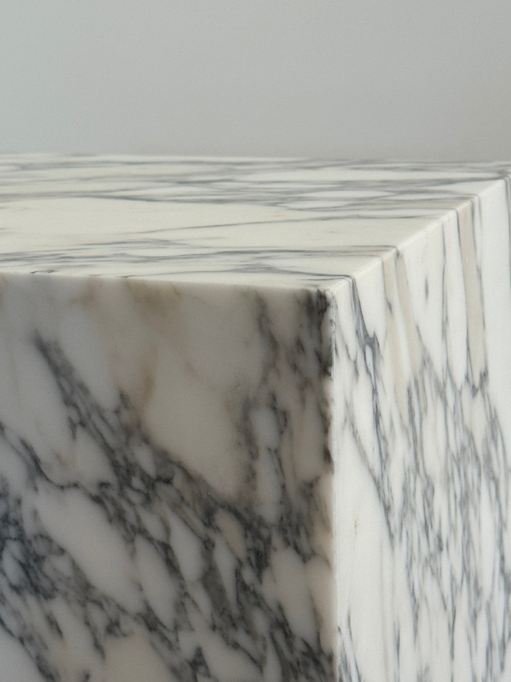 Close-up of a marble surface with gray and white patterns, honed finishing. Premium quality luxury marble.